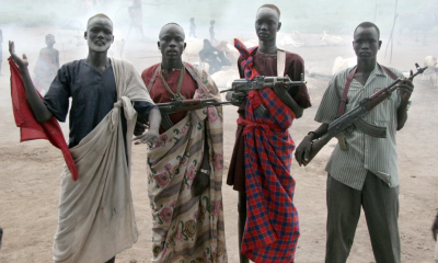 Militantes armados no Sudão (Foto: Randy Fath/Unsplash)